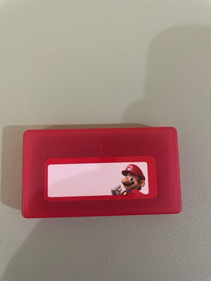 Nintendo DS Super Mario collectible cartridge case like new, holds 4 cartridges