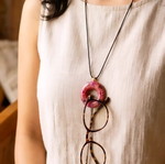 Handmade ceramic necklace with hanging glasses holder, floral apple color