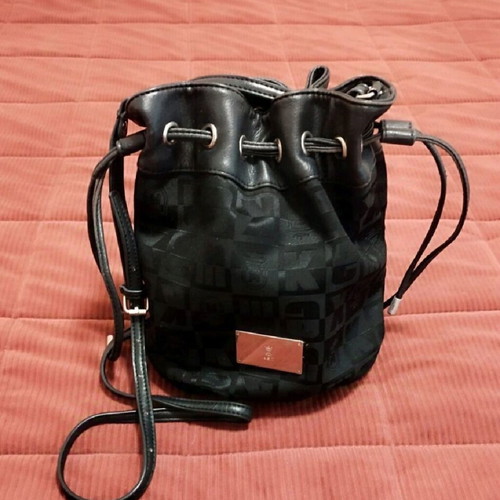 Kem crossbody bag used in black color with logo