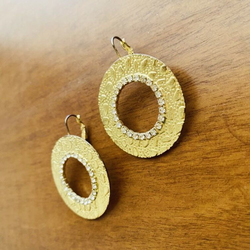 Earrings used, gold color