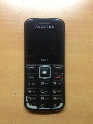 Alcatel 1010 used black phone without charger and battery