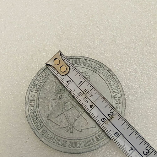 Commemorative collectible Coast Guard coin medal used