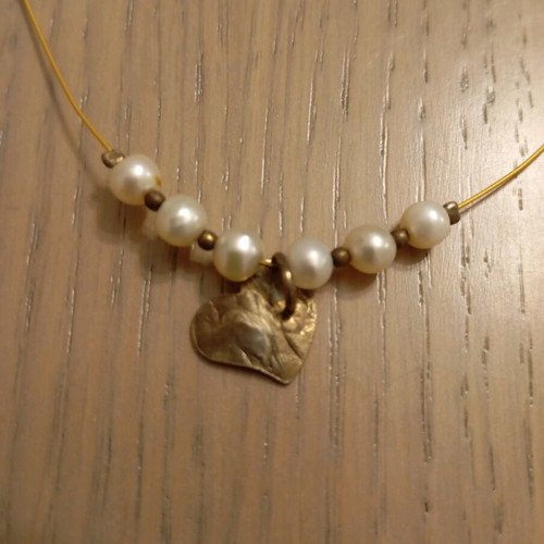 Necklace with heart and small pearls used