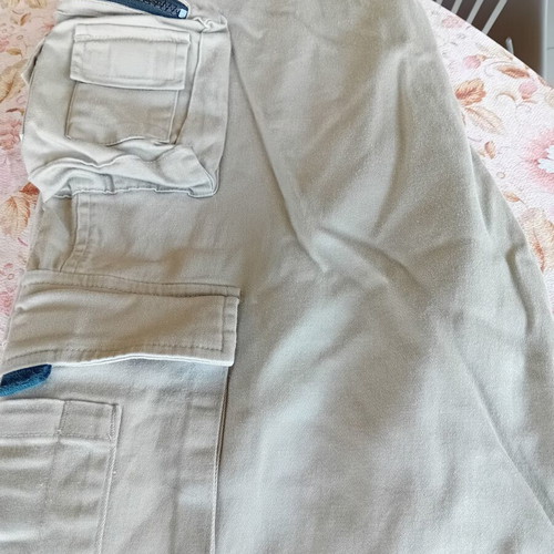 Timberland men's beige pants with 6 front and 2 back zip pockets, size 34