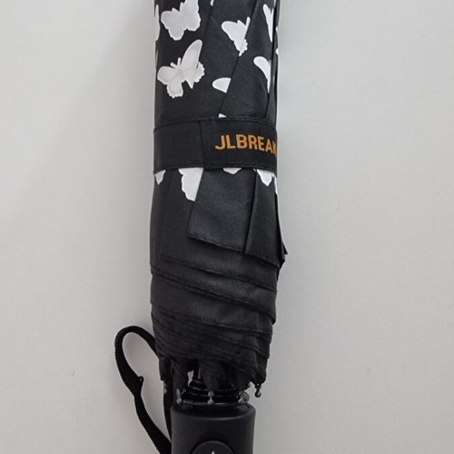 Color Changing Umbrella new, black and white butterfly design