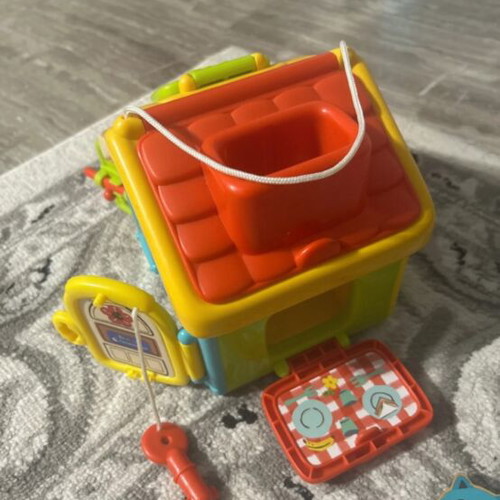 Educational Mobility Toy like new with wooden cat