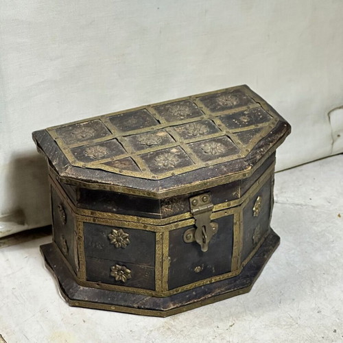 Vintage wooden jewelry box with brass decorations used