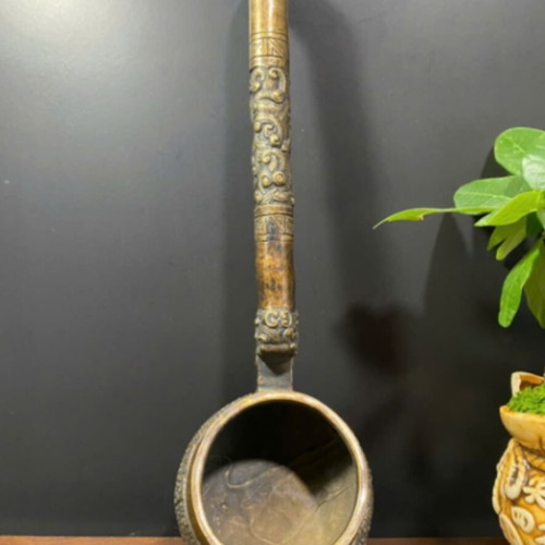 Antique Vietnamese bronze vessel used with dragon and floral design