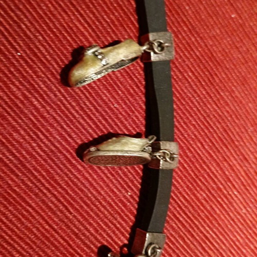 Rubber bracelet with charms like new