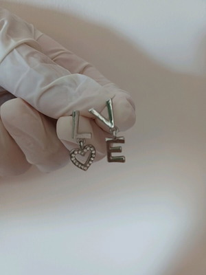 Stainless steel earrings new with LOVE design