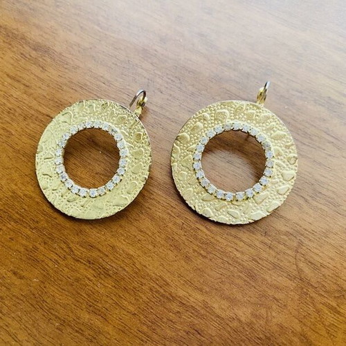 Earrings used, gold color