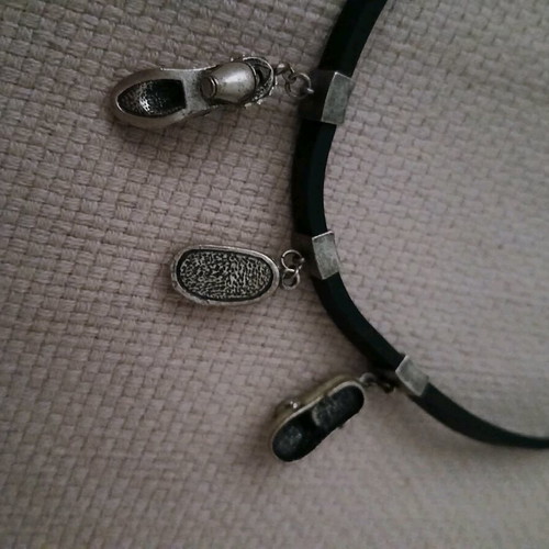Rubber bracelet with charms like new