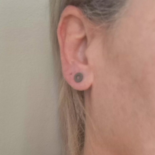 Silver asymmetric 925 studs with geometric circles, like new