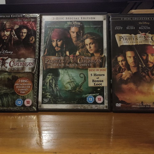 Pirates of the Caribbean DVD set like new, comedy action fantasy