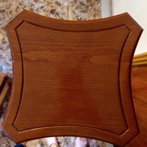 Handcrafted tall wooden plant stand with carved floral details