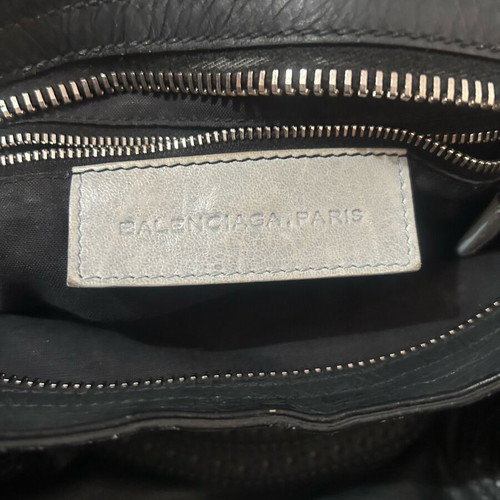 Balenciaga handbag used with long shoulder strap and company mirror