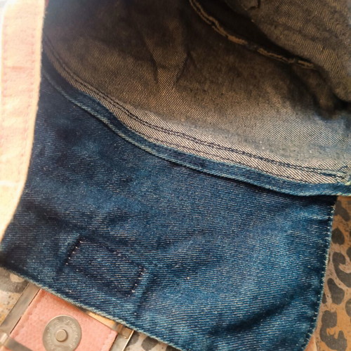 Denim handbag used with pink details
