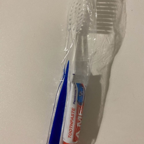 Toothbrush and toothpaste for travel, new, pack of 2