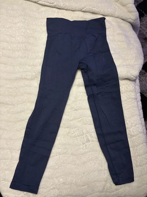 Blue sports leggings like new with seam on buttocks, size L