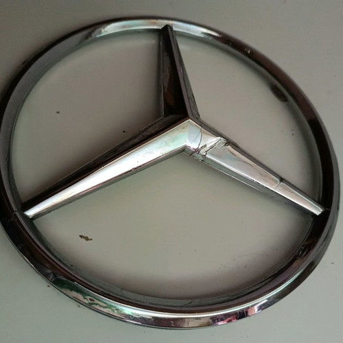 Plastic Mercedes emblem used from truck