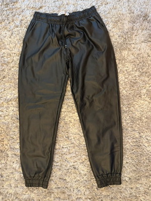 Leather pants with elastic fit, size L, like new