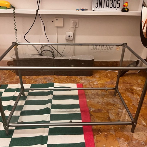 Coffee table used with metal silver frame and glass surface