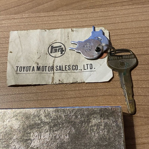 Collectible Toyota box with engine key and Corolla 1973 antenna like new