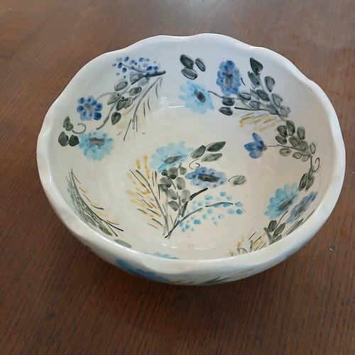 Hand-painted clay bowl like new with floral design
