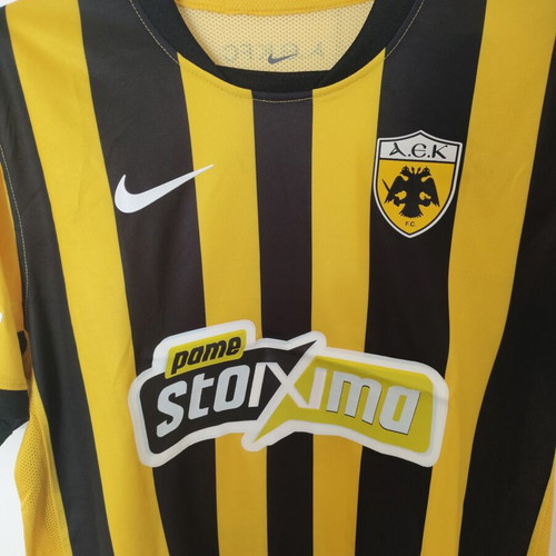 AEK 2025-26 football jersey with PINEDA name, large, replica