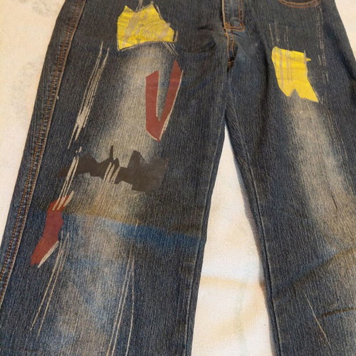 Jeans like new with colorful geometric details