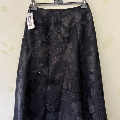 A-Style black skirt with floral pattern and satin detail, new