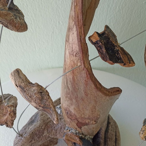 Handmade table decor with driftwood and metal design