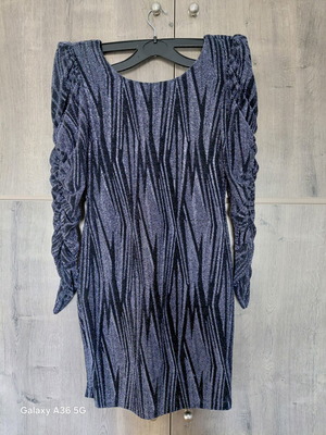 BSB Mini Dress like new with geometric pattern and ruched sleeves