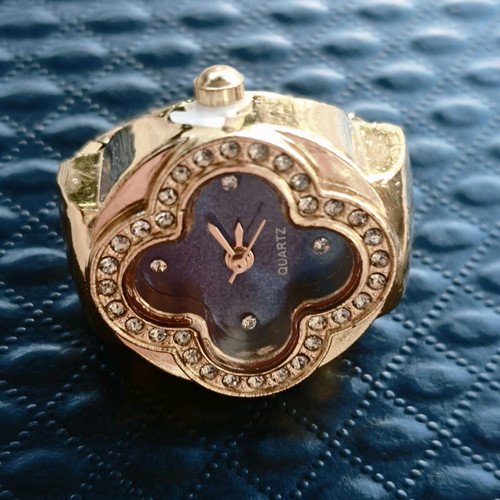 Four-leaf ring like new with quartz watch, blue dial and crystals