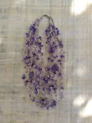 Handmade necklace with purple and white beads