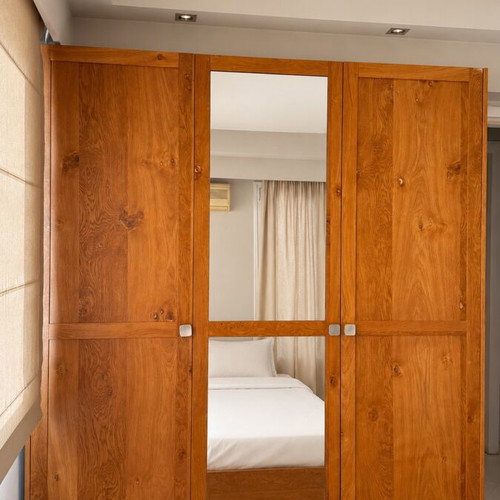 Handmade wooden wardrobe, natural finish