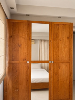 Handmade wooden wardrobe, natural finish