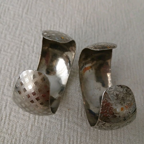 Vintage cuff bracelets like new, embossed geometric and floral design, set of 2