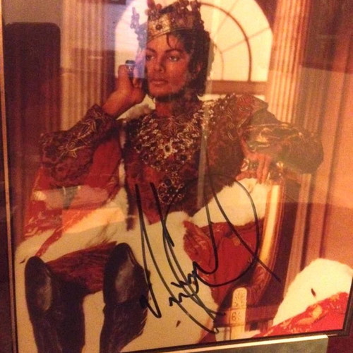 Michael Jackson autograph used in framed glass display