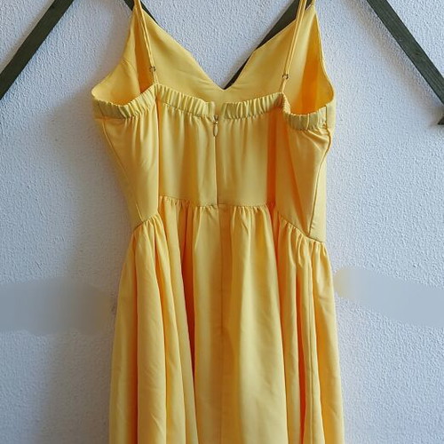 Yellow short dress used, size Small with adjustable straps