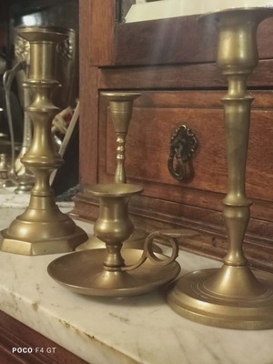Brass candlesticks used, set of 4 pieces