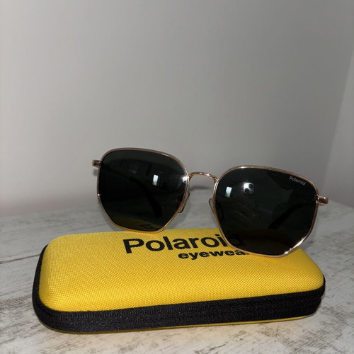 Polaroid sunglasses like new, black metal frame