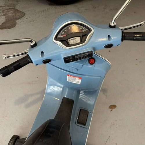 Electric kids Vespa ride-on toy