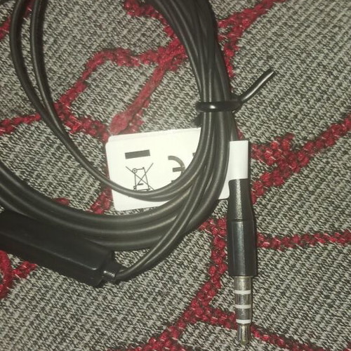 Wired black and gold earphones with 3.5 mm jack