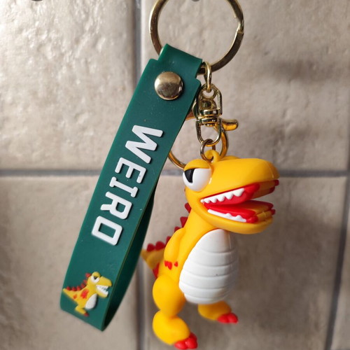 Dinosaur keychain like new