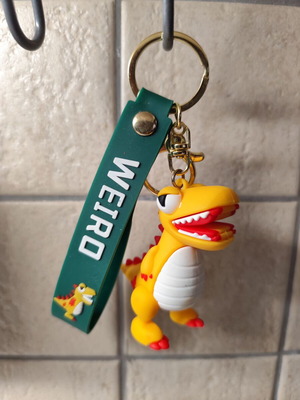 Dinosaur keychain like new