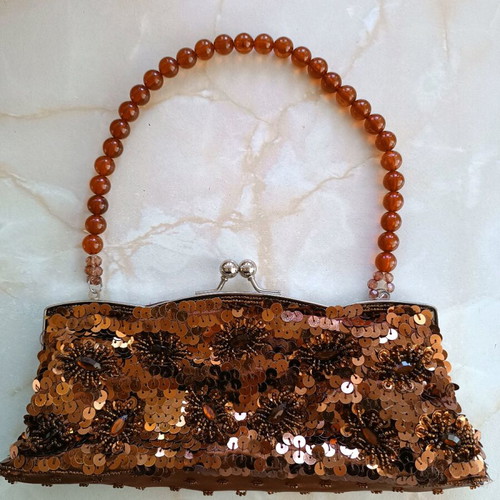 Beaded bag like new, handheld
