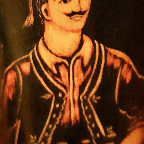 Ebony vase pair like new with Greek traditional costumes