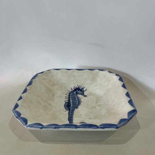 Vintage Italian ceramic serving bowl with seahorse design and marble effect used