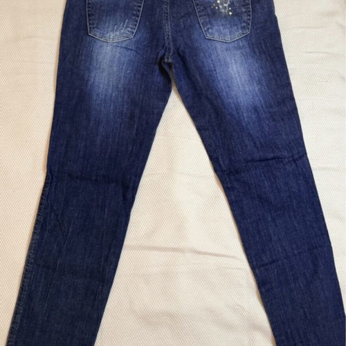 Vintage blue Rococo jeans with studs and rips like new